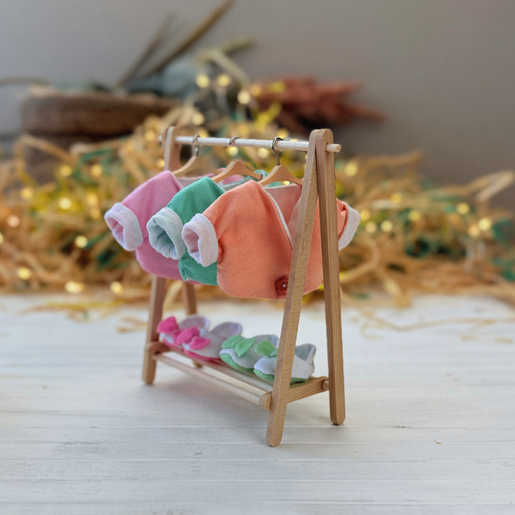 Each PDF sewing pattern includes clear instructions, photos, and video support so you can easily sew tiny dresses, costumes, and add-ons. Designed to mix &amp; match with all Mini Dolls and seasonal collections, these outfits make play even more magical.