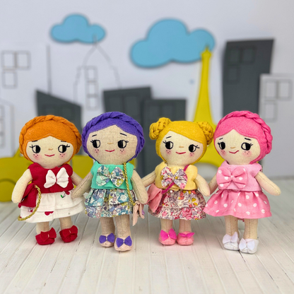 Mini Girl Doll PDF sewing pattern by Stella Pattern Studio featuring the City Stroll Outfit Set with a blouse, two skirt options, mules with bows, and a clutch bag. Beginner-friendly doll sewing tutorial with step-by-step instructions, video support, and free Mini Girl Dolls Coloring Pages.
