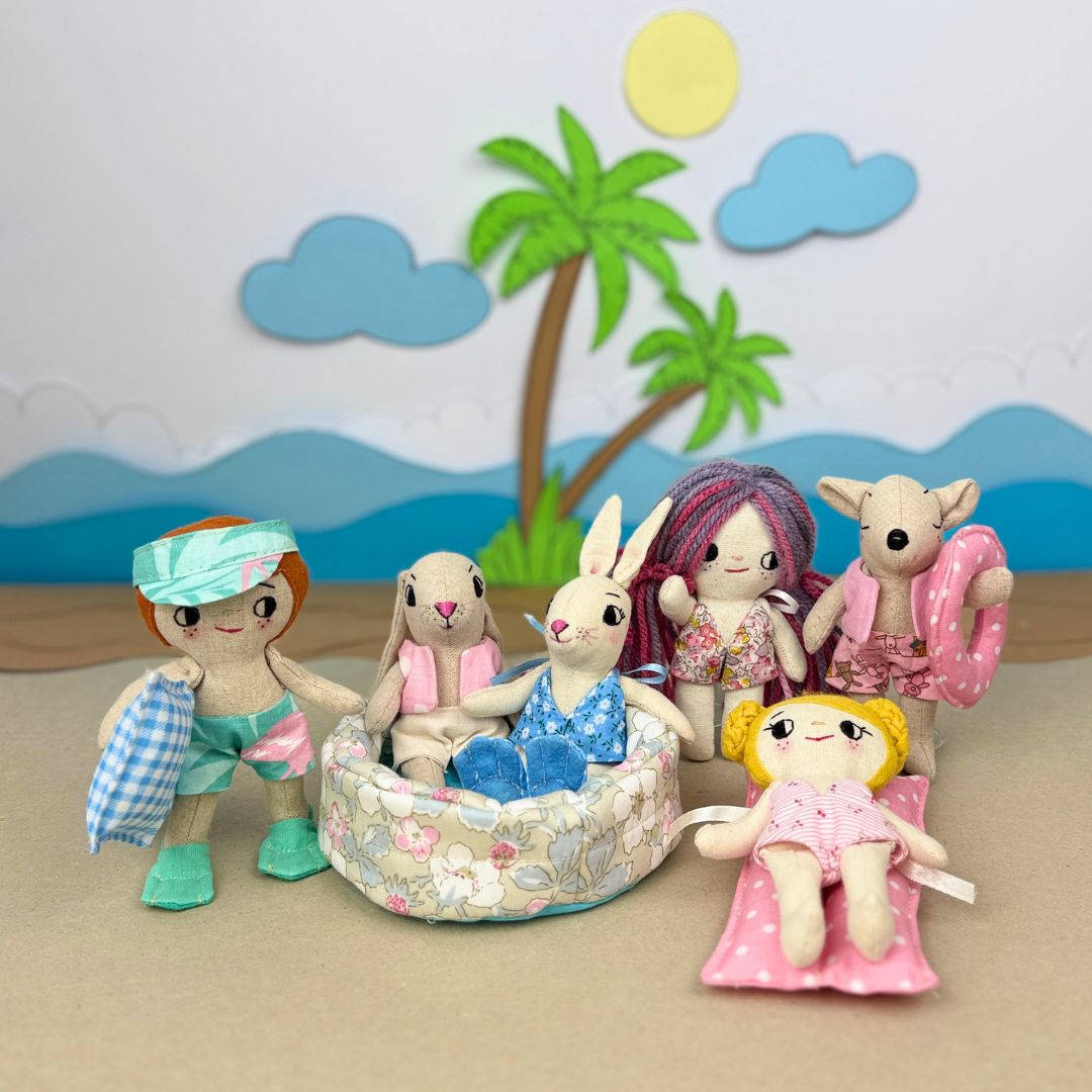 Mini Boy Doll & Pool Day Set beginner-friendly PDF sewing pattern with handmade fabric doll, doll clothes, pool, float, ring, swim fins, shorts, summer vest, and sun visor.
