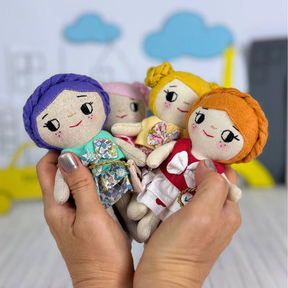 Mini Girl Doll PDF sewing pattern by Stella Pattern Studio featuring the City Stroll Outfit Set with a blouse, two skirt options, mules with bows, and a clutch bag. Beginner-friendly doll sewing tutorial with step-by-step instructions, video support, and free Mini Girl Dolls Coloring Pages.