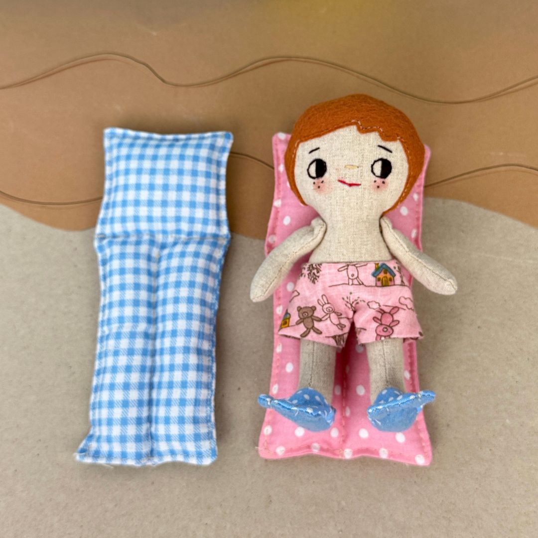 Mini Boy Doll & Pool Day Set beginner-friendly PDF sewing pattern with handmade fabric doll, doll clothes, pool, float, ring, swim fins, shorts, summer vest, and sun visor.