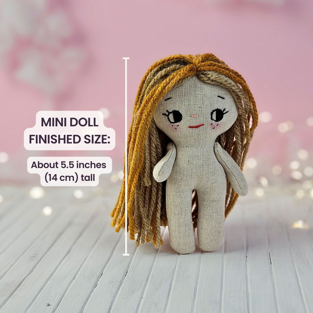 Create your own 5.5” Miniature Fabric Doll with Dress using the easy-to-follow PDF sewing pattern from Stella Pattern Studio. This delightful rag doll is perfect for dollhouses and can wear a variety of outfits, making her ideal for imaginative play.